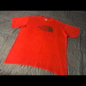 red northface t shirt.